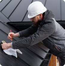 AquaCraft Waterproofing team reviewing a project