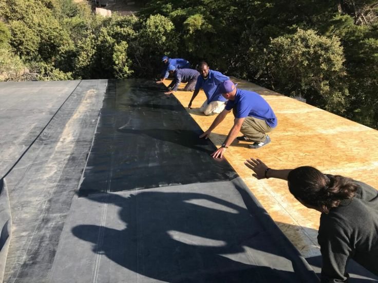Applying industrial waterproofing membrane